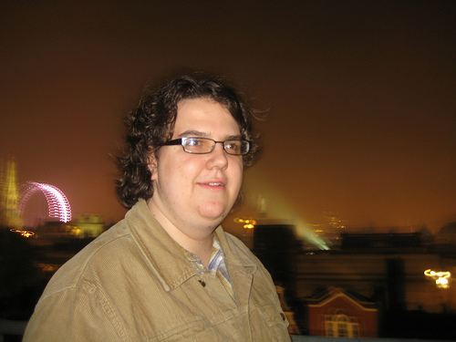 Eric with the lights of London in the background.